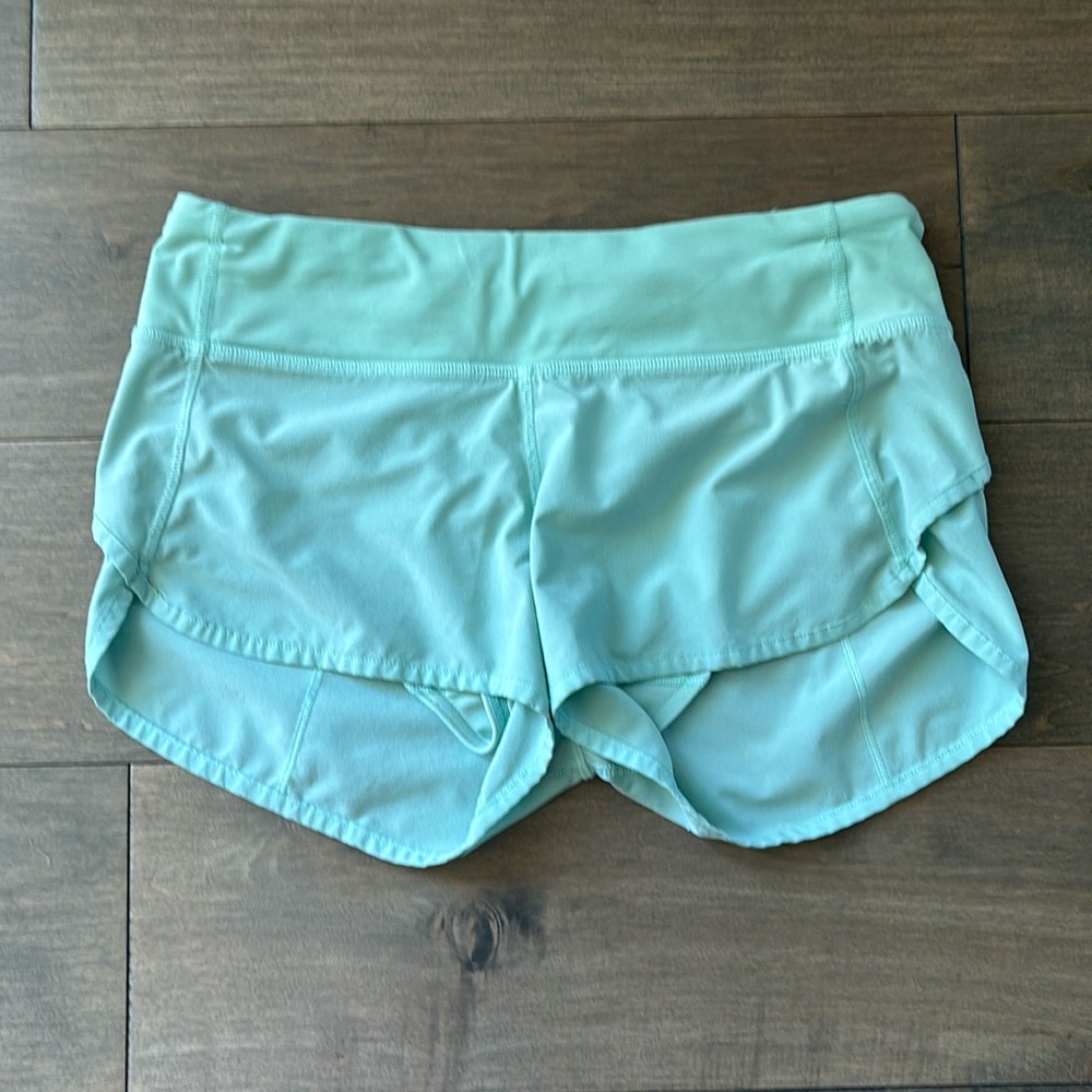 Lululemon Sea Foam Green 2.5 inch inseam size 4 speed up shorts.